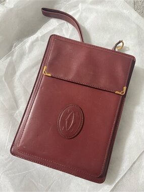 Cartier red wine Leather Clutch/Wristlet with Gold Accents